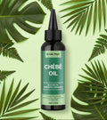 Briski Hair Chébé Oil bottle on a green background with leaves